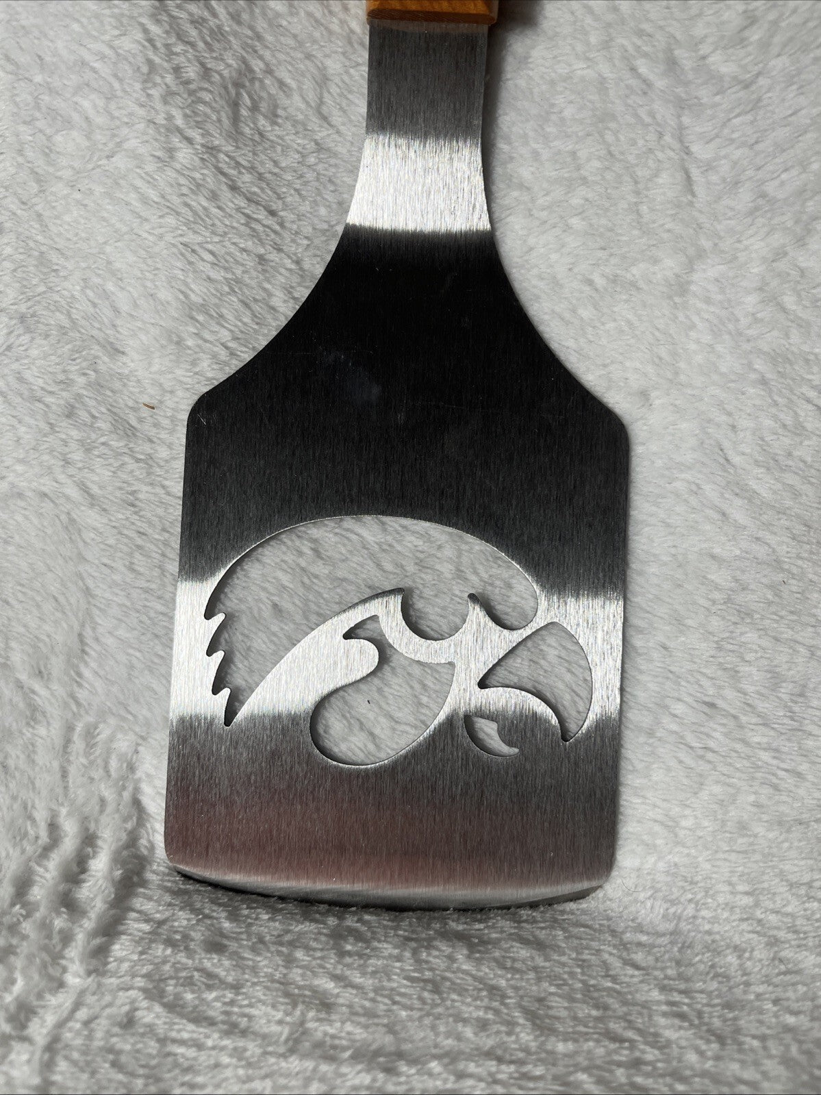 Grilling spatula with the University of Iowa's Hawkeyes log