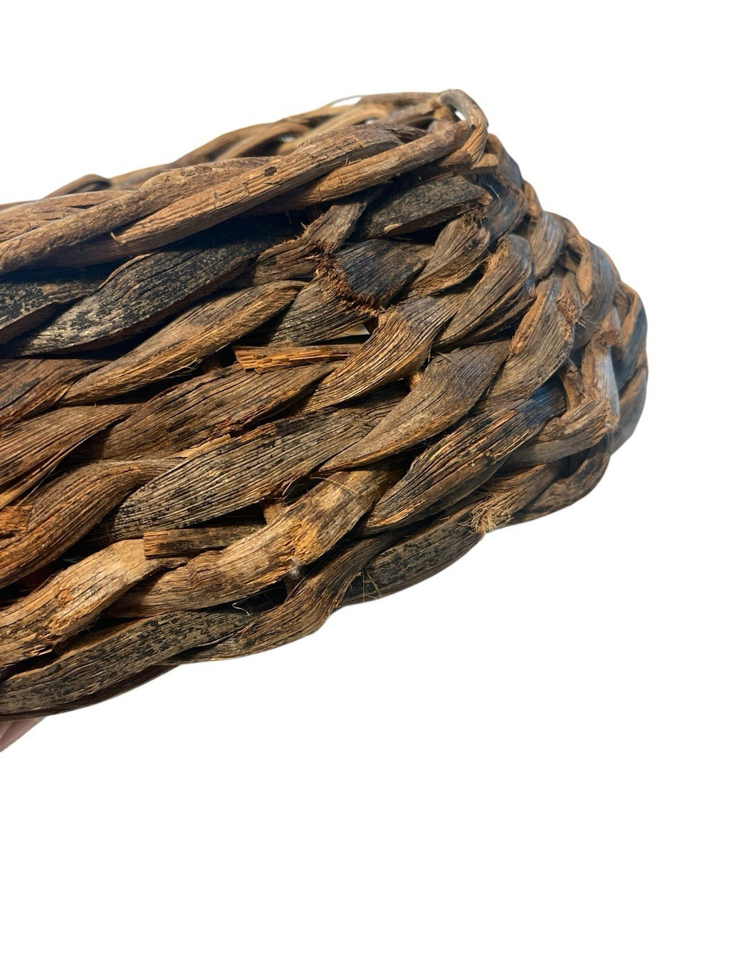 Rustic Hand Woven Basket Made From Natural Materials In An Oval Shape