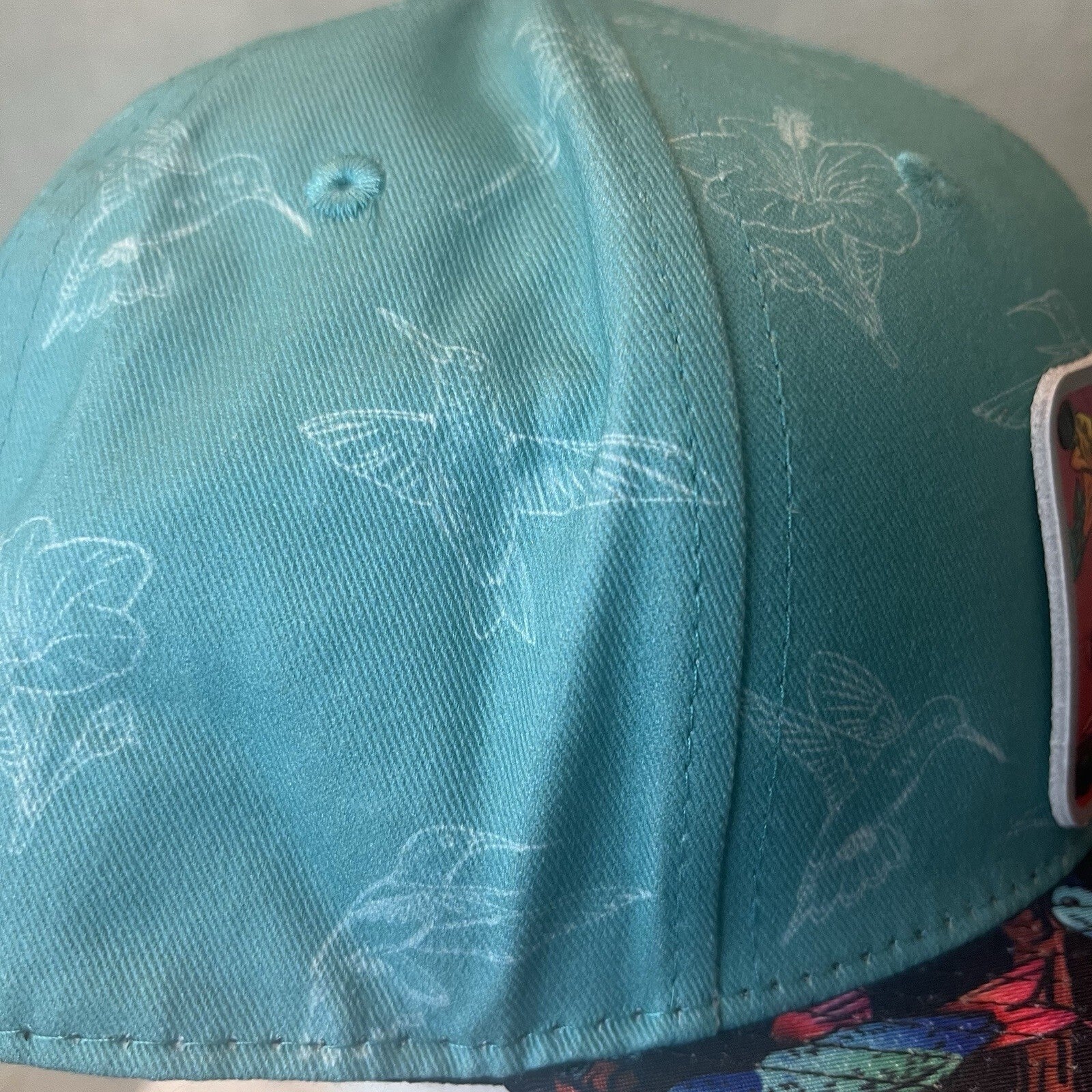 ADJUSTABLE SNAPBACK Hat Citylocs. Hummingbird print with front patch Joycicle