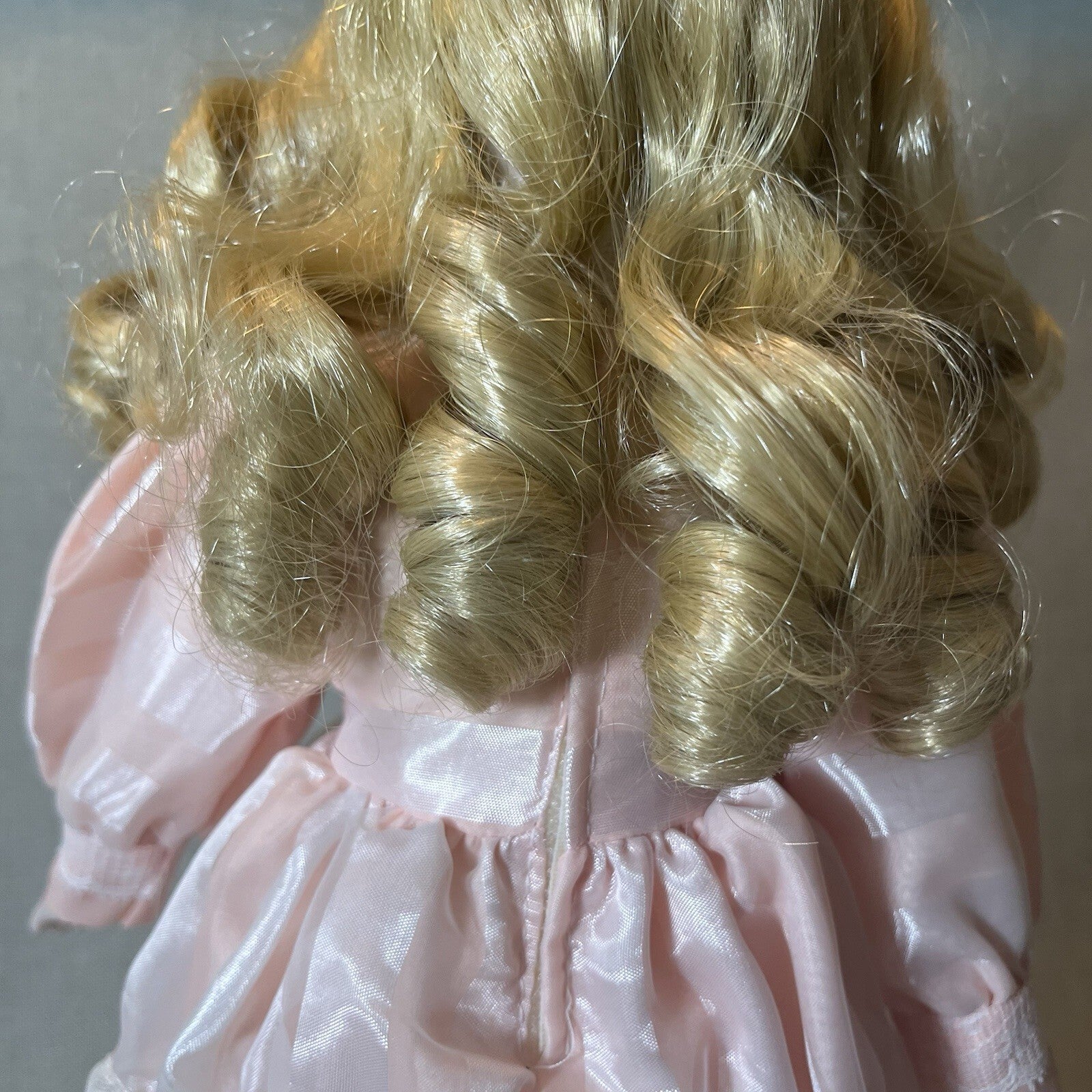 Dynasty doll collection. Porcelain Doll pink Ruffle dress.  17”