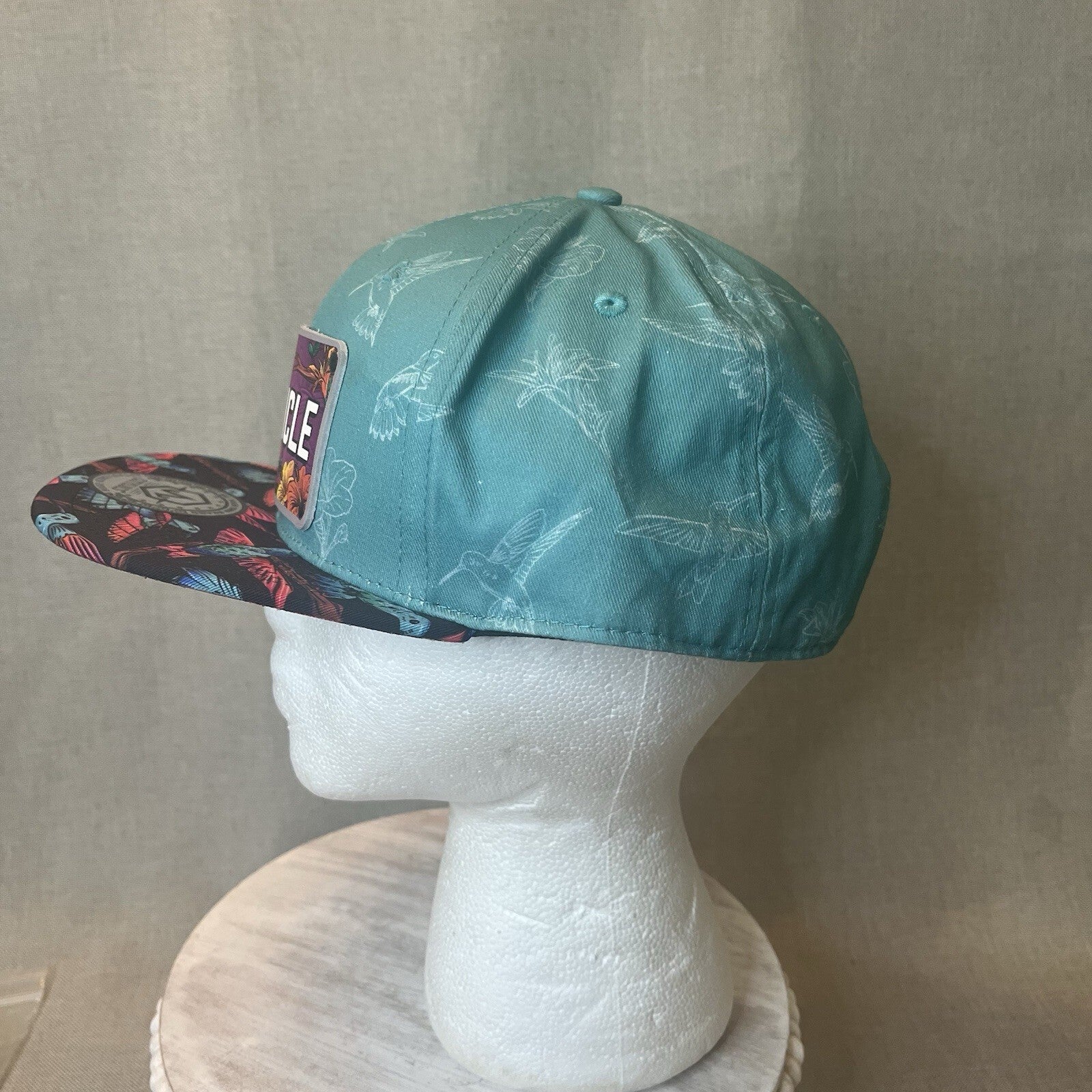 ADJUSTABLE SNAPBACK Hat Citylocs. Hummingbird print with front patch Joycicle