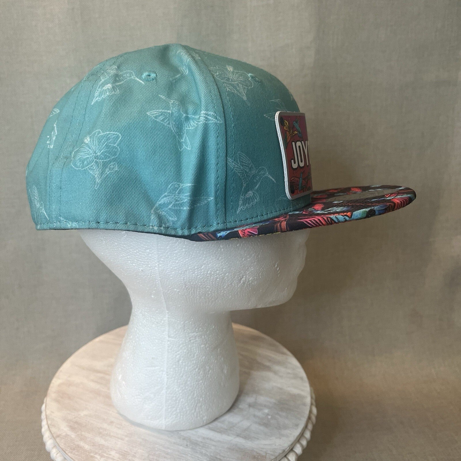 ADJUSTABLE SNAPBACK Hat Citylocs. Hummingbird print with front patch Joycicle