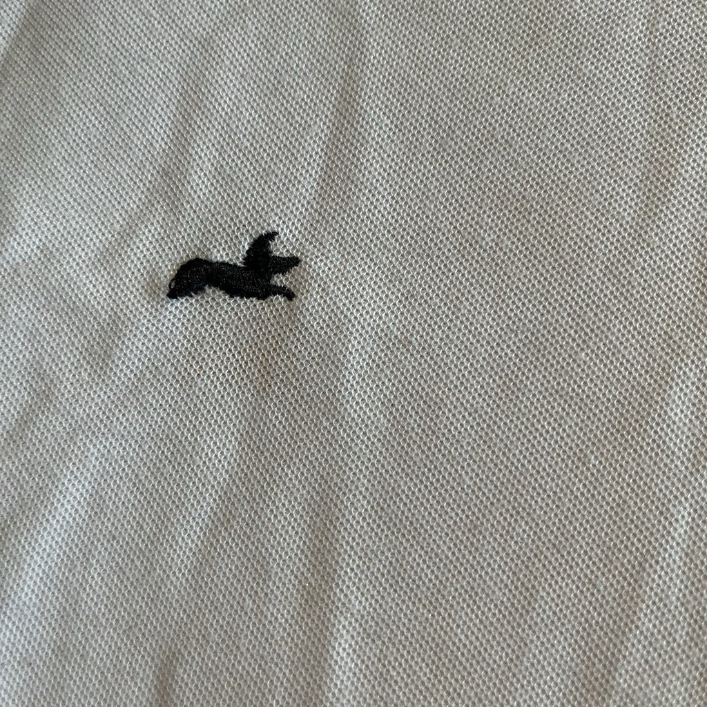 A cool polo shirt with camo collar an accent fox. White 3xl