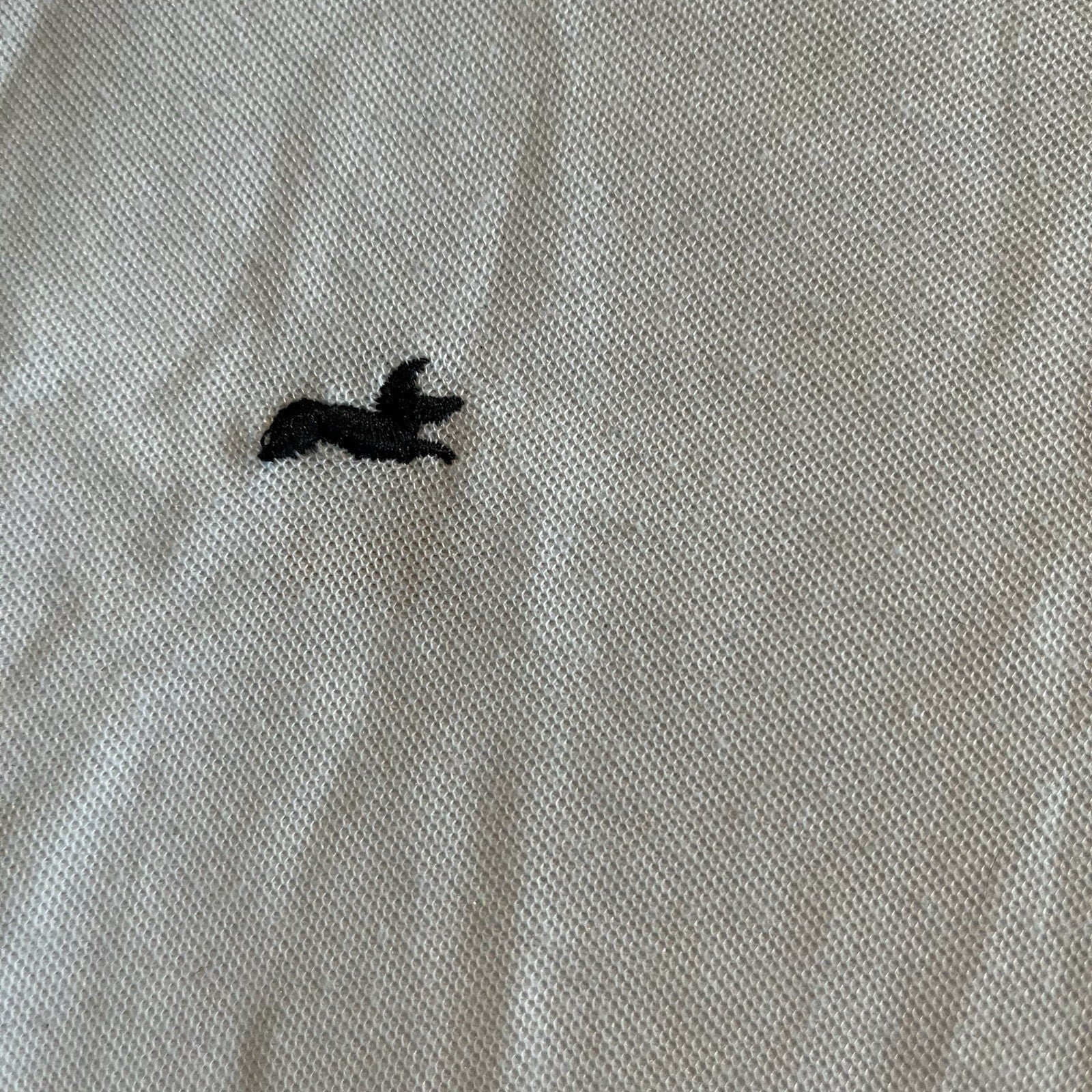 A cool polo shirt with camo collar an accent fox. White 3xl
