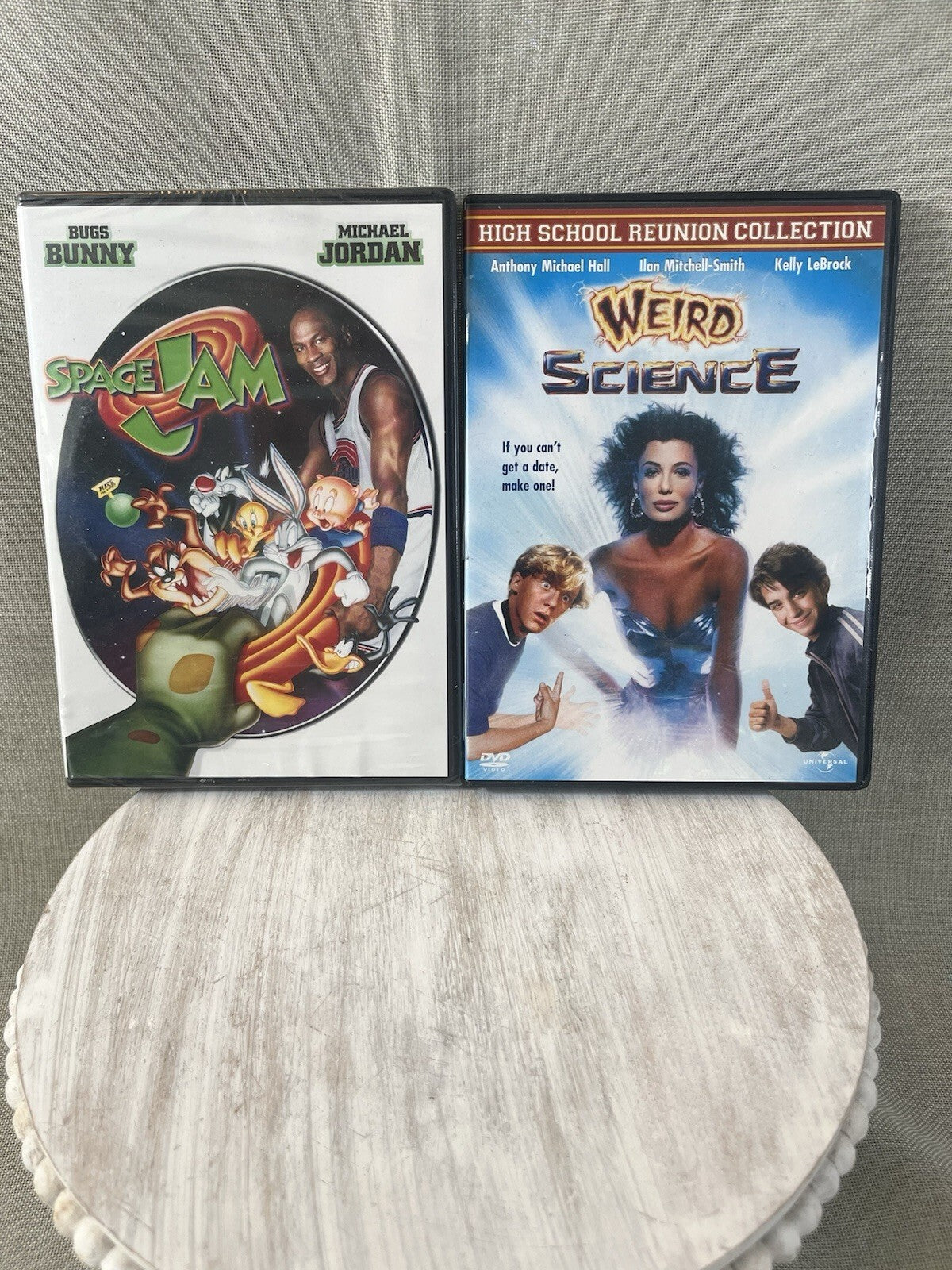 Dvds 2 Weird science and Space Jam.  Brand New Still In Plastic Packaging..