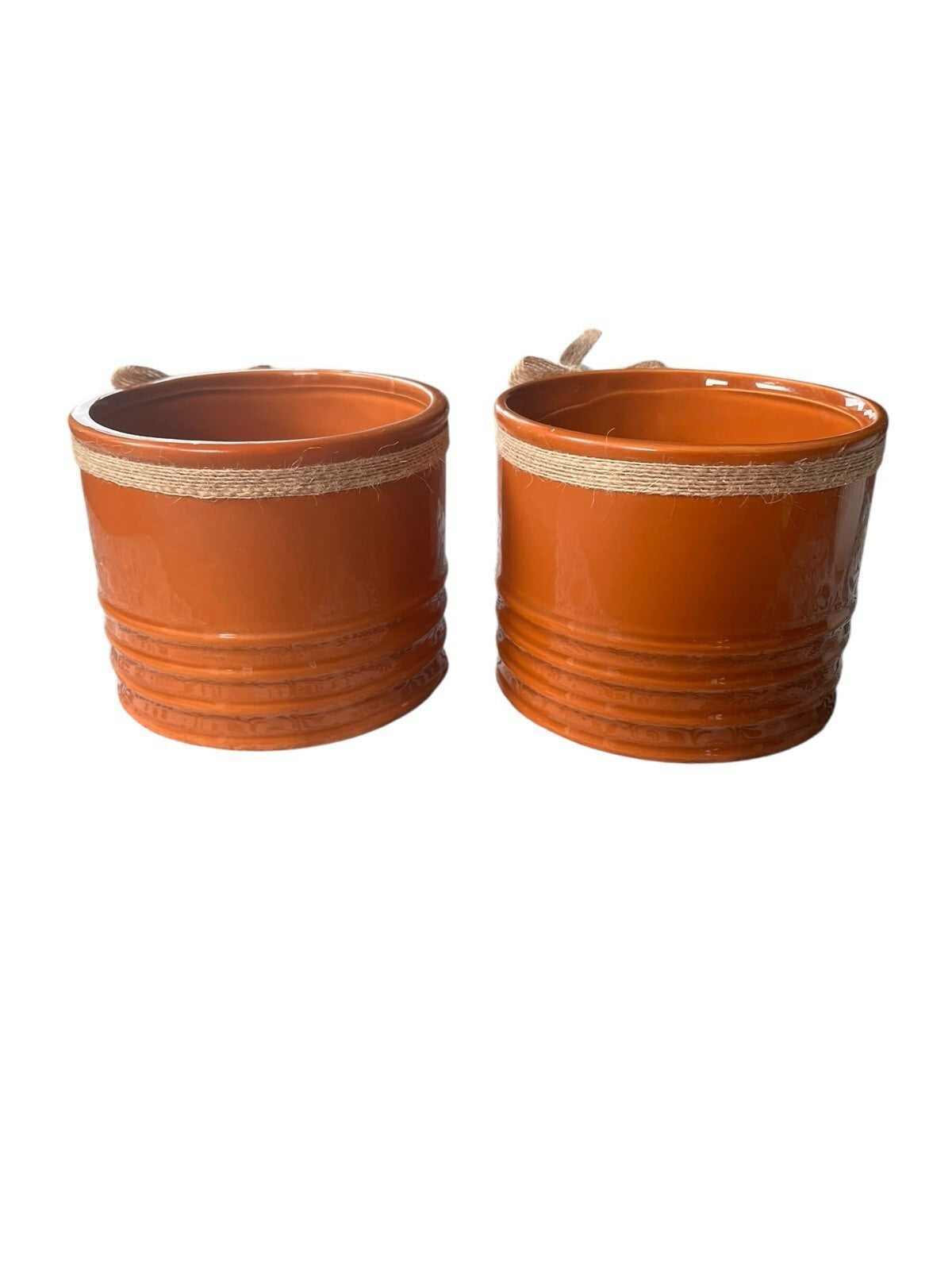 ceramic decorative planters with twine and metal leaf accents