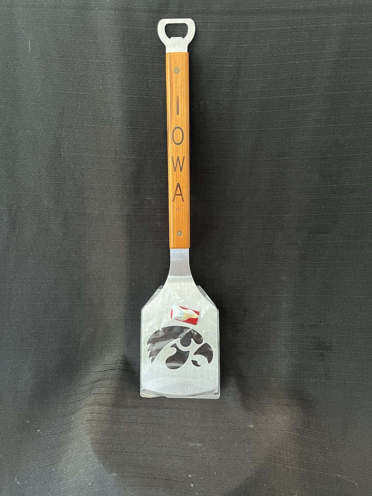 The Sportula IOWA HAWKEYES Metal Grill Spatula W/Wooden Handle 18”X4”. NEW