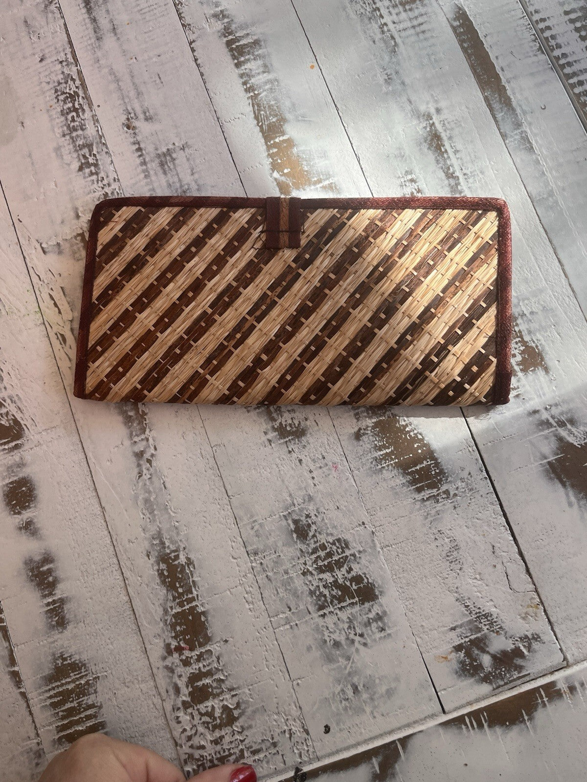 Bohemian style woven straw clutch, with snap closure and embroidered design