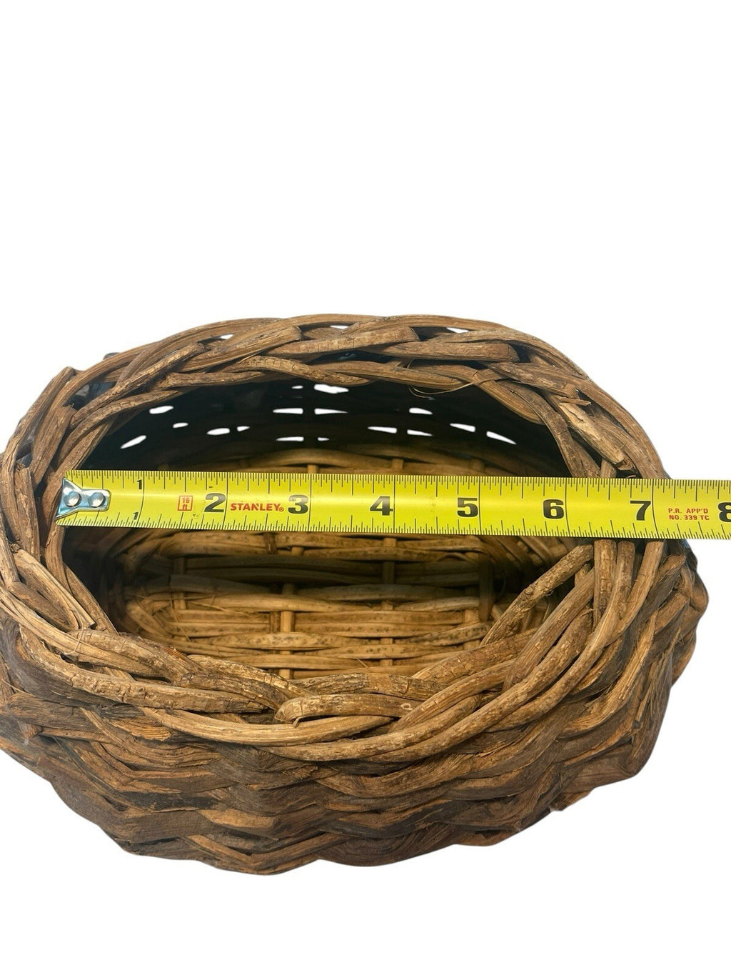 Rustic Hand Woven Basket Made From Natural Materials In An Oval Shape