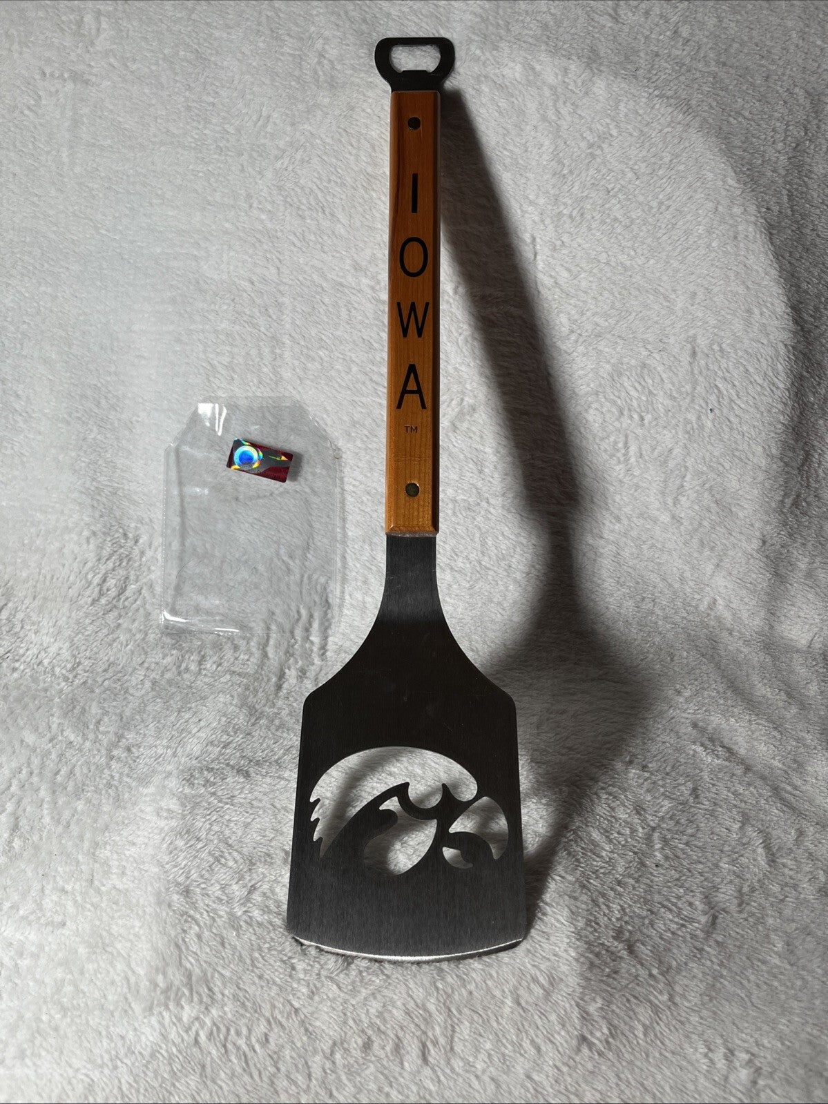 Grilling spatula with the University of Iowa's Hawkeyes log