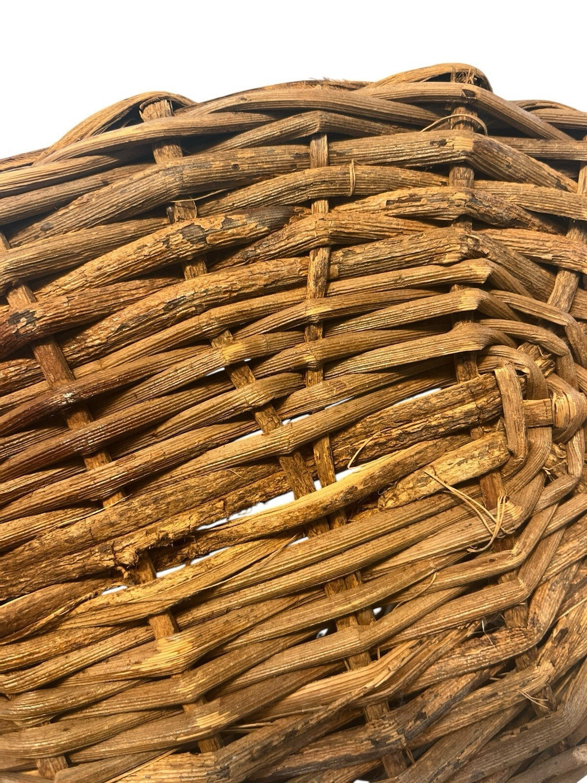 Rustic Hand Woven Basket Made From Natural Materials In An Oval Shape
