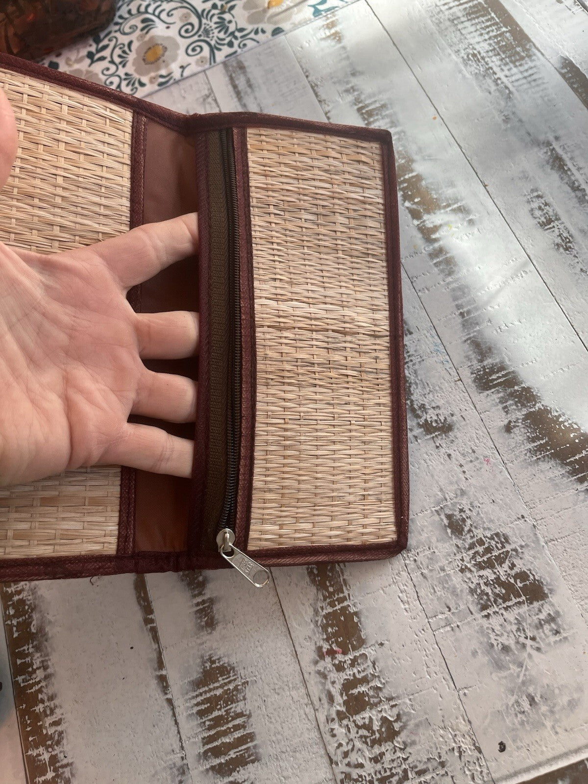 Bohemian style woven straw clutch, with snap closure and embroidered design