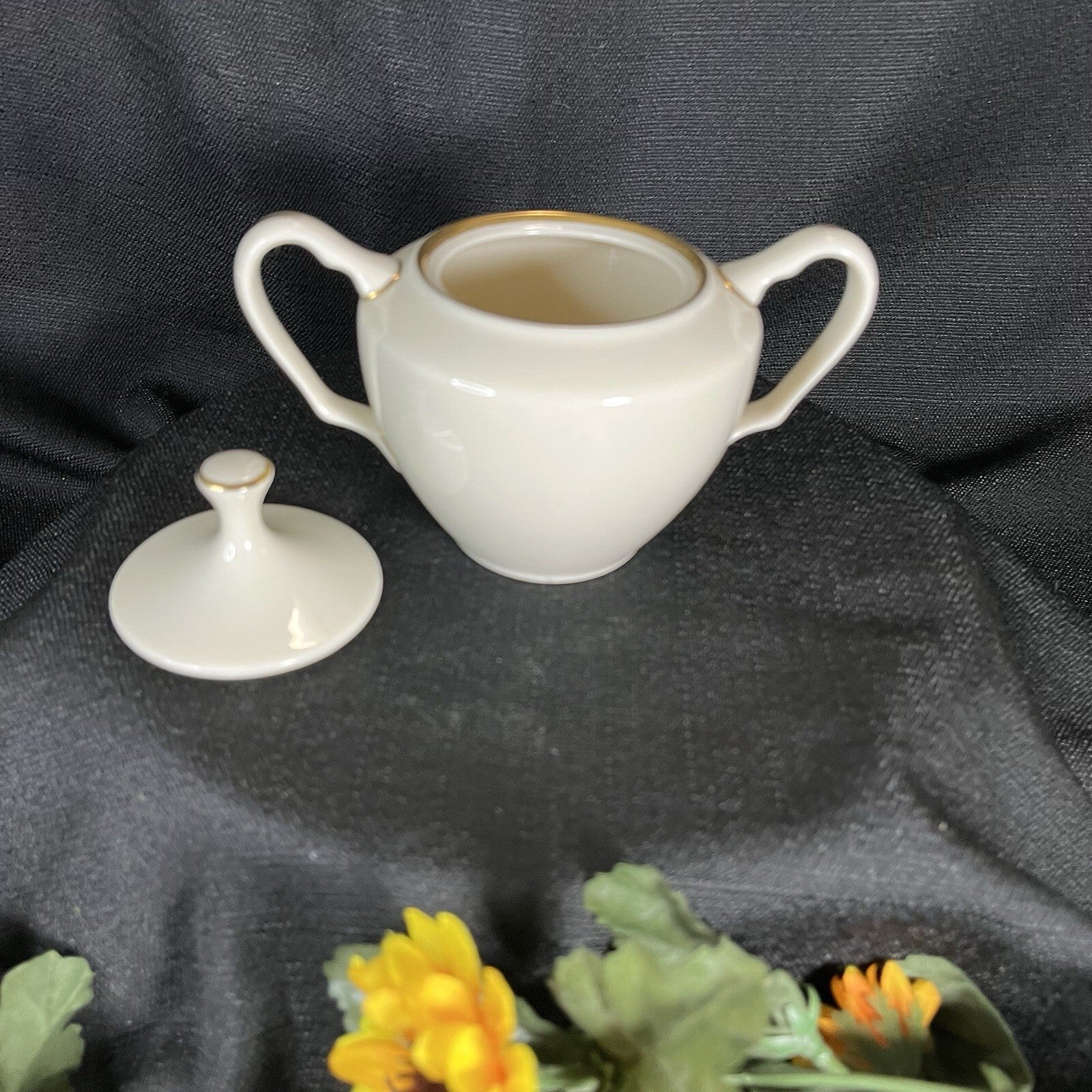 Lenox "Mansfield" pattern sugar bowl with a lid and gold trim