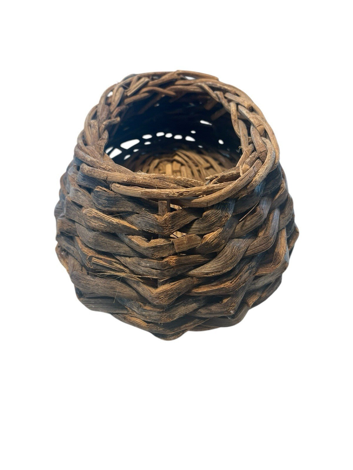 Rustic Hand Woven Basket Made From Natural Materials In An Oval Shape