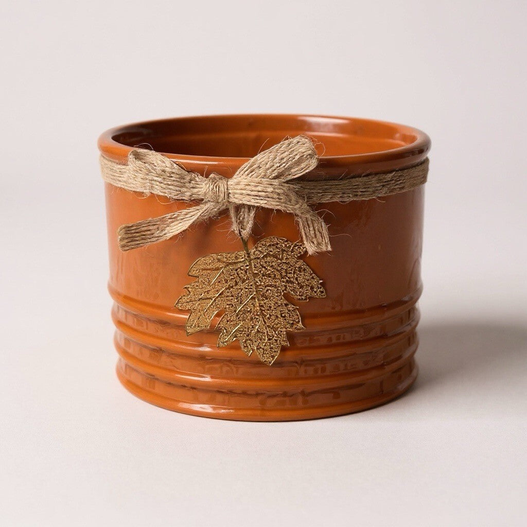 ceramic decorative planters with twine and metal leaf accents
