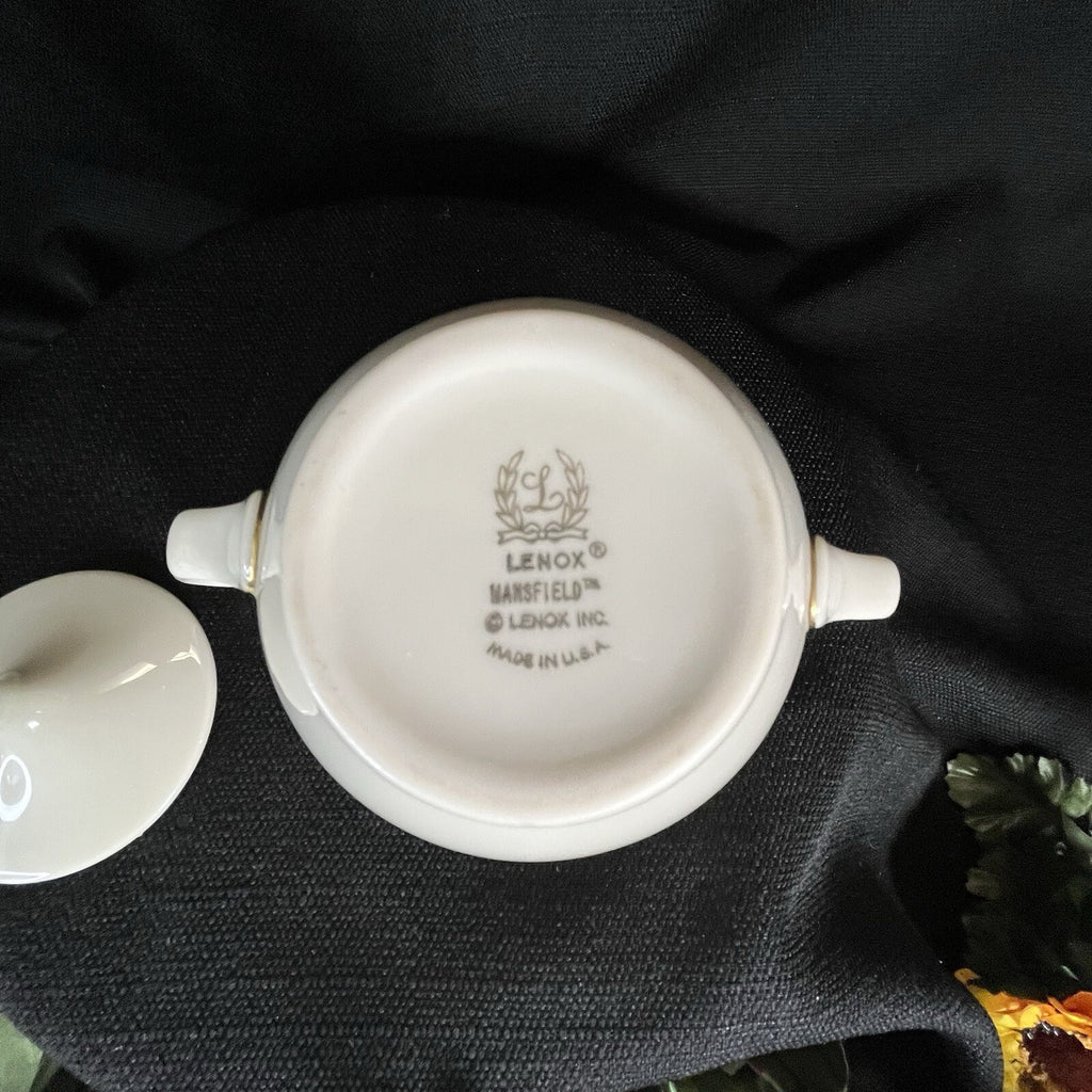 Lenox "Mansfield" pattern sugar bowl with a lid and gold trim