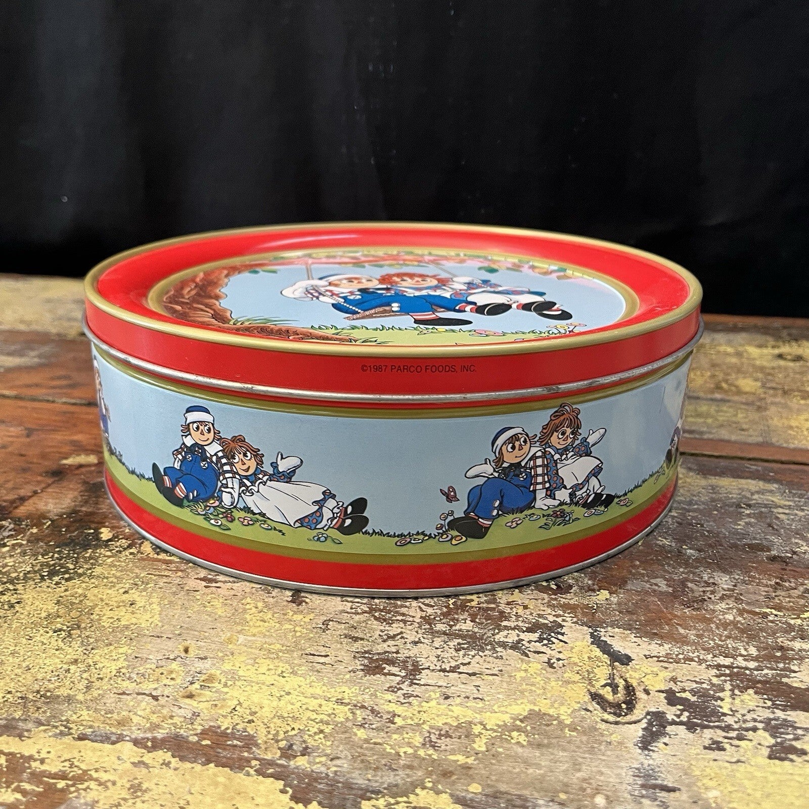 Vintage 1987 Panco Foods Raggedy Ann and Raggedy Andy 12” Tin round metal cookie