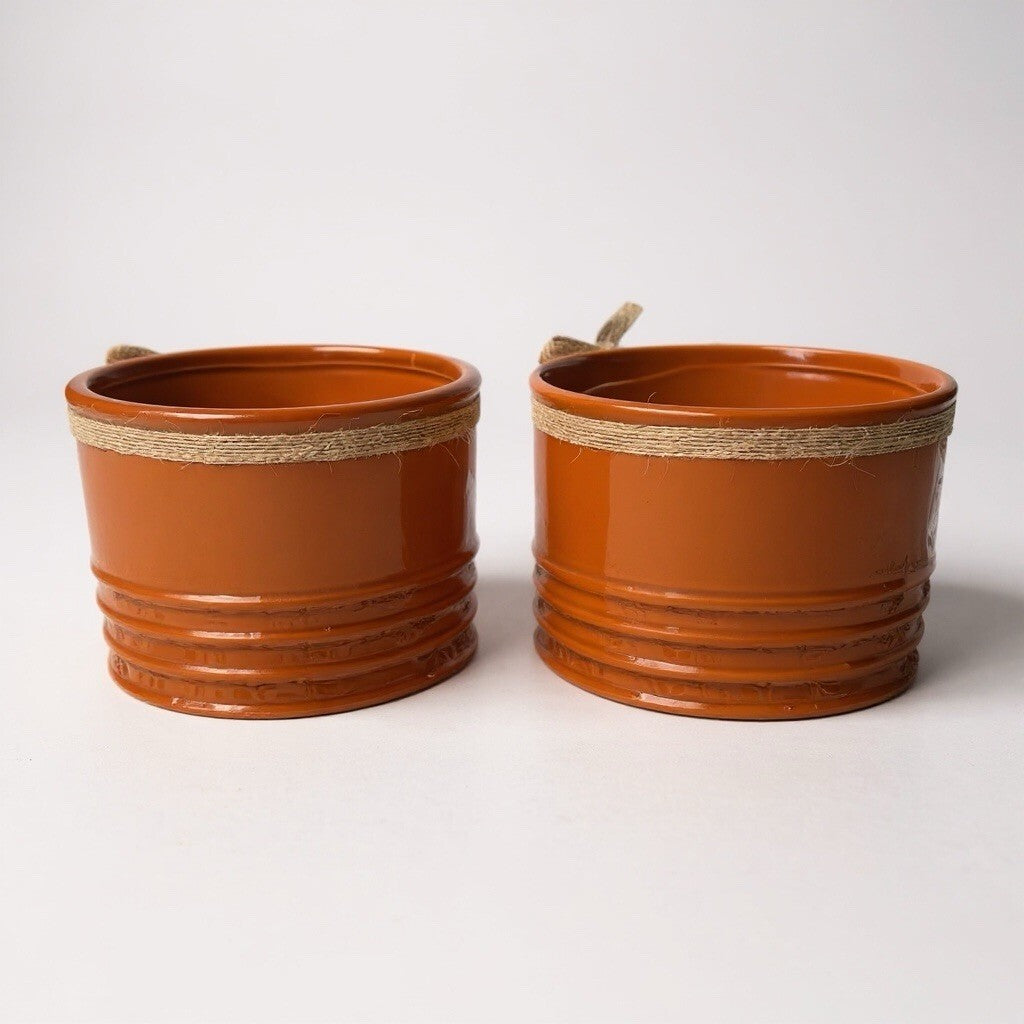 ceramic decorative planters with twine and metal leaf accents