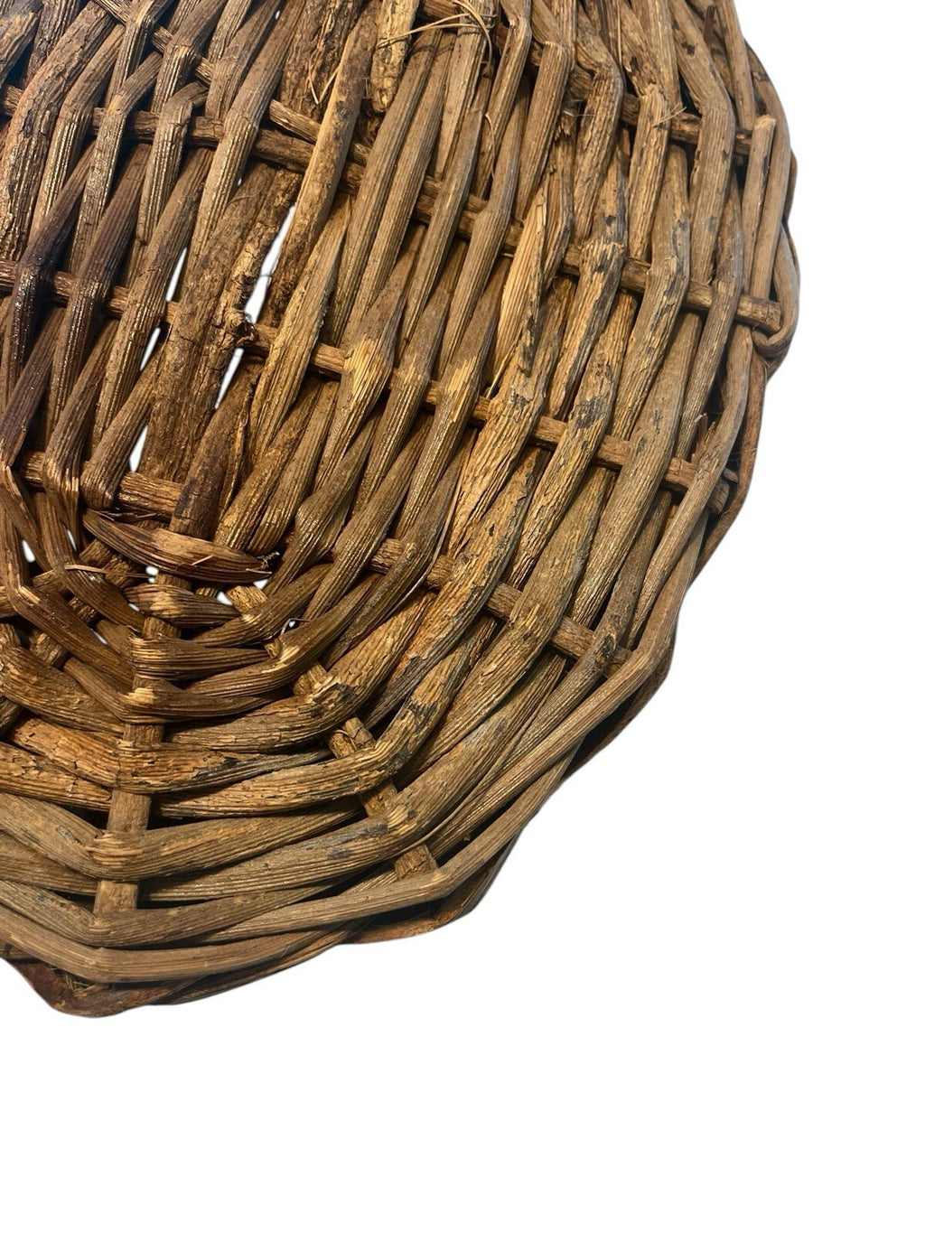 Rustic Hand Woven Basket Made From Natural Materials In An Oval Shape