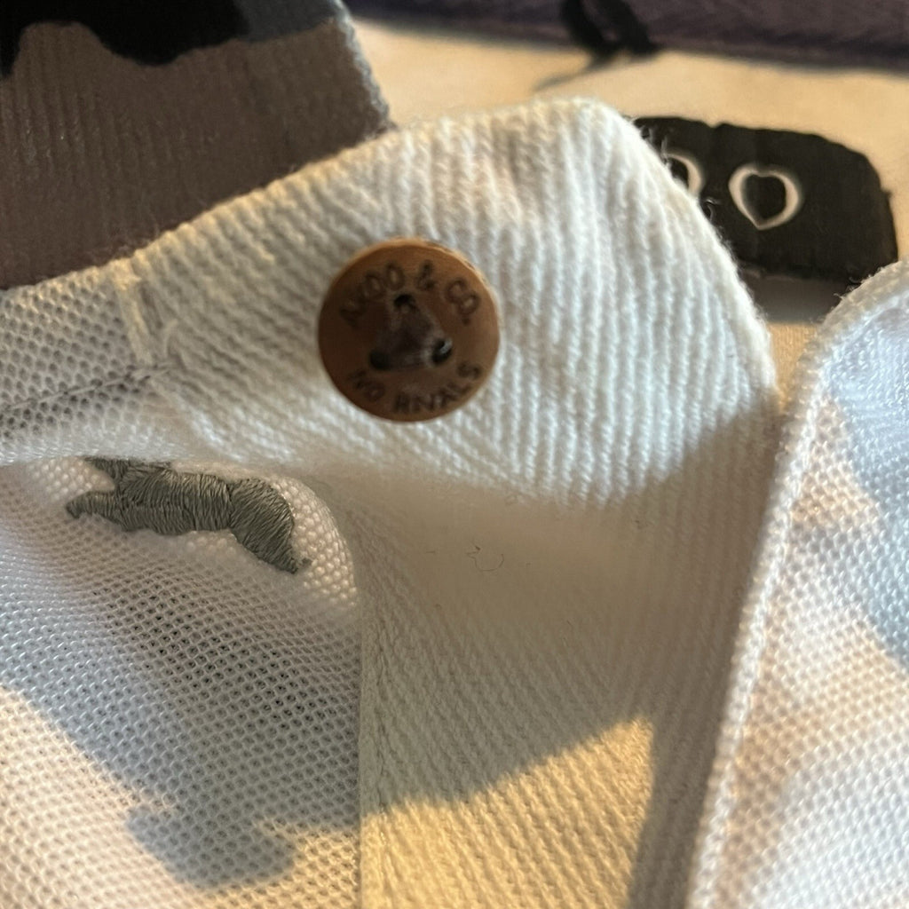 A cool polo shirt with camo collar an accent fox. White 3xl
