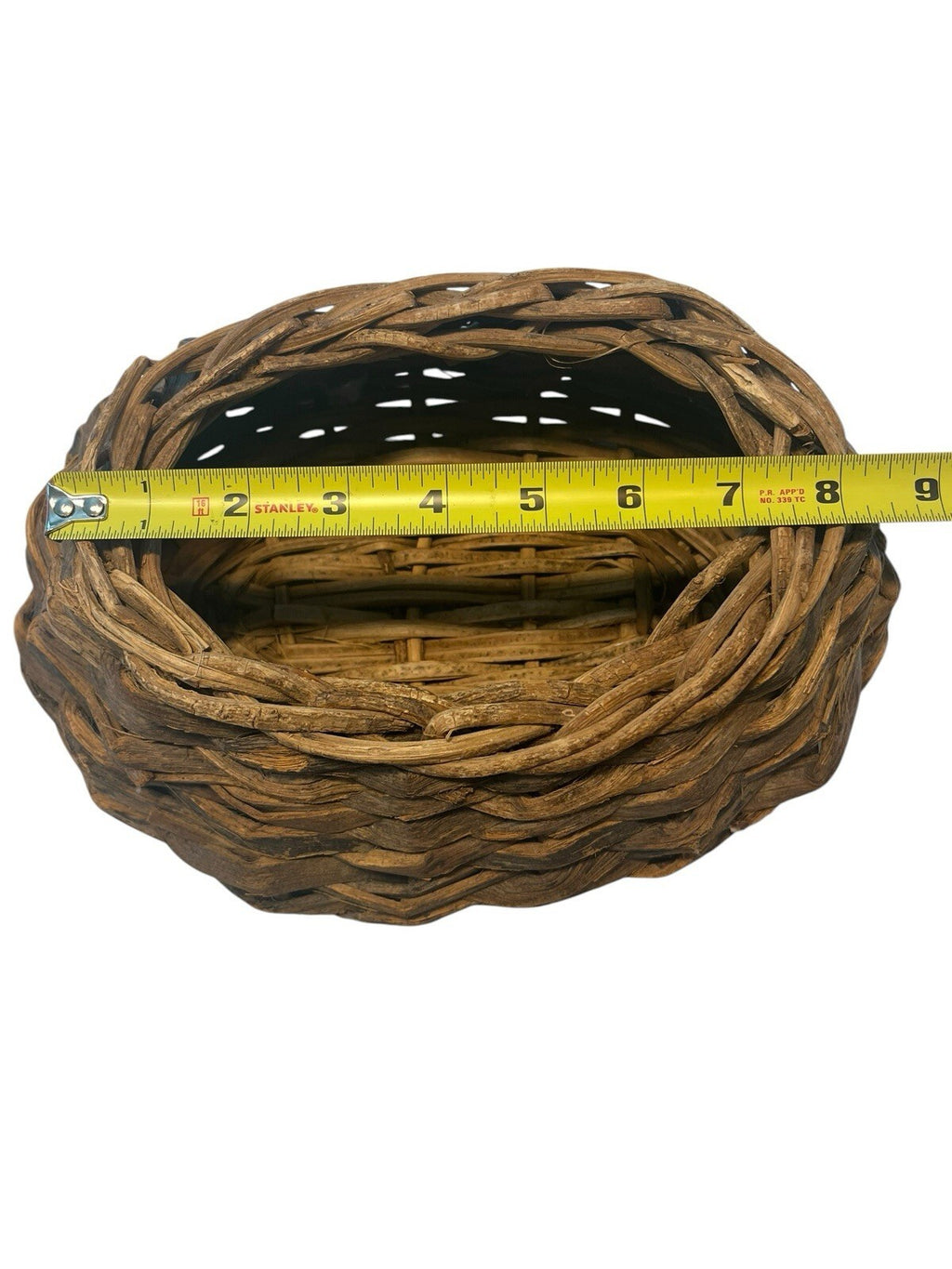 Rustic Hand Woven Basket Made From Natural Materials In An Oval Shape