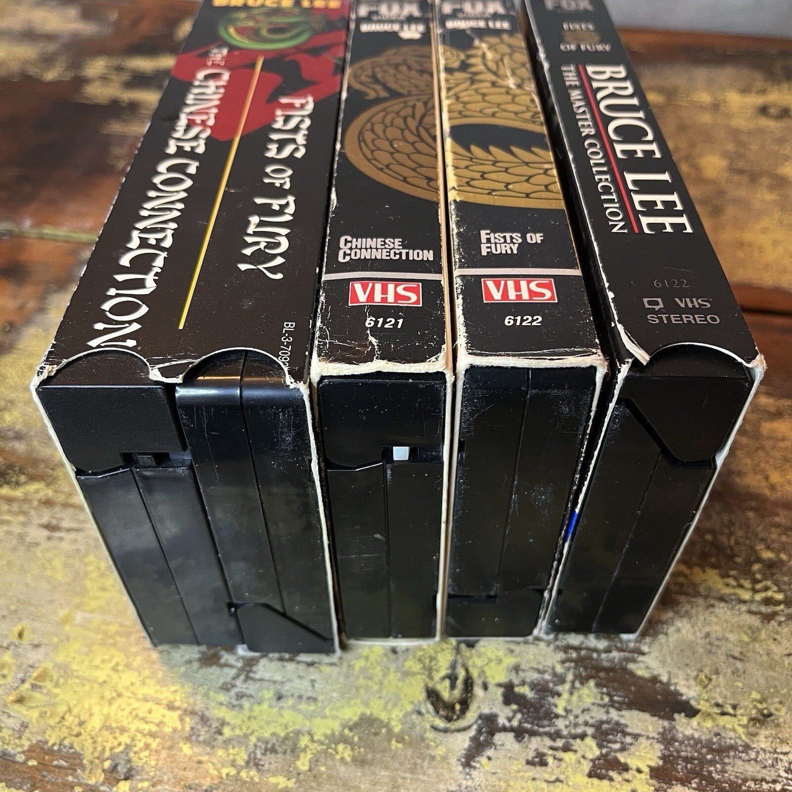 VHS collection of Bruce Lee videos. Package is not in perfect condition.